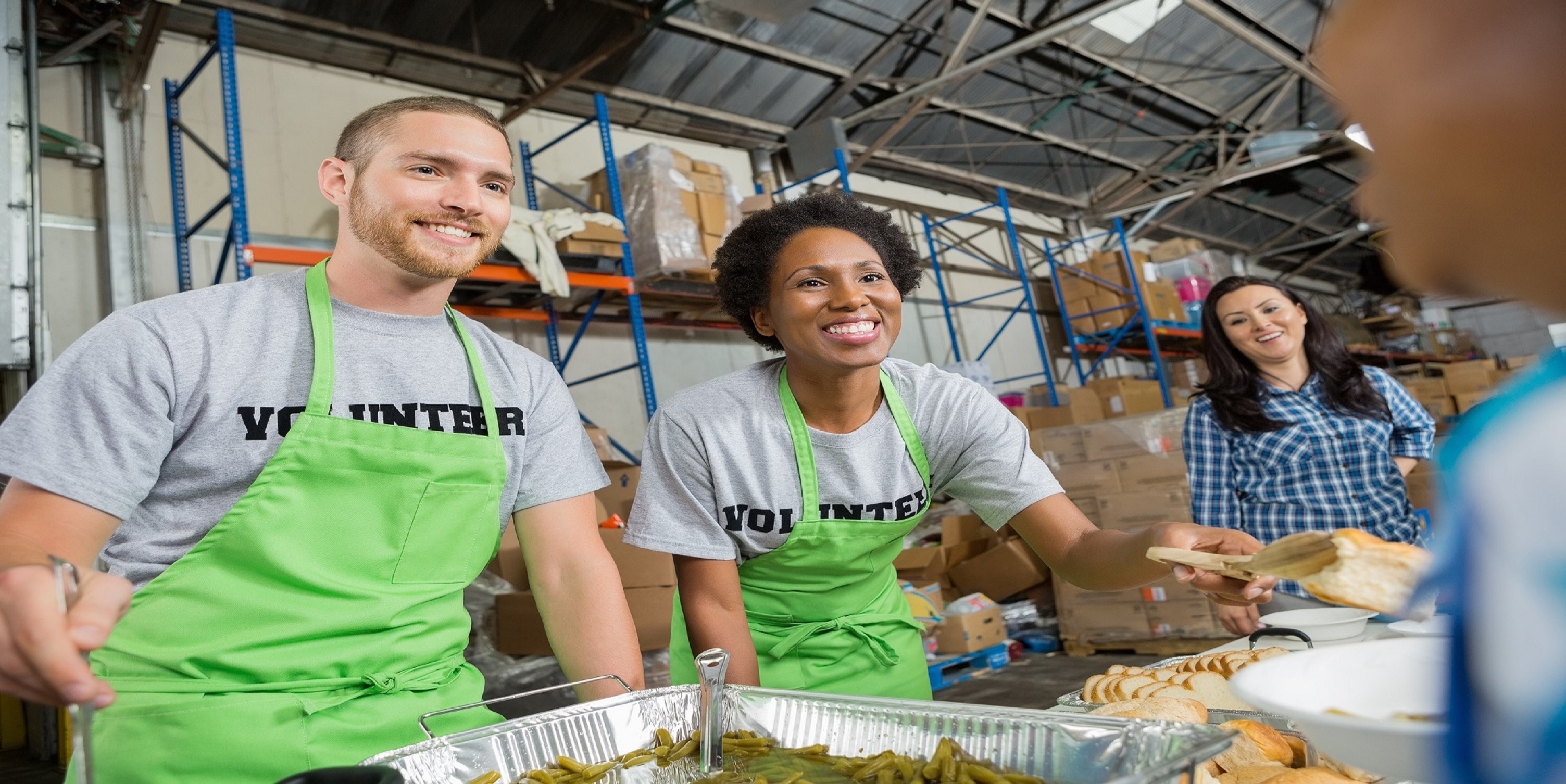 Employees volunteering at a soup kitchen